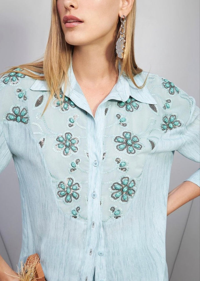 Conjunto pantalon flare y camisa bordada