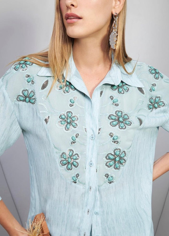 Conjunto camisa bordada y pant flare