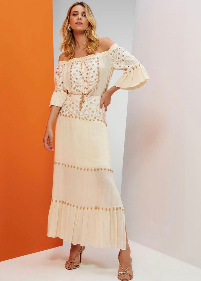 Conjunto camisa y falda pompones