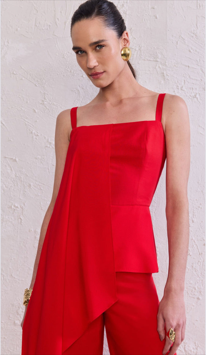 Braga con capa y volante