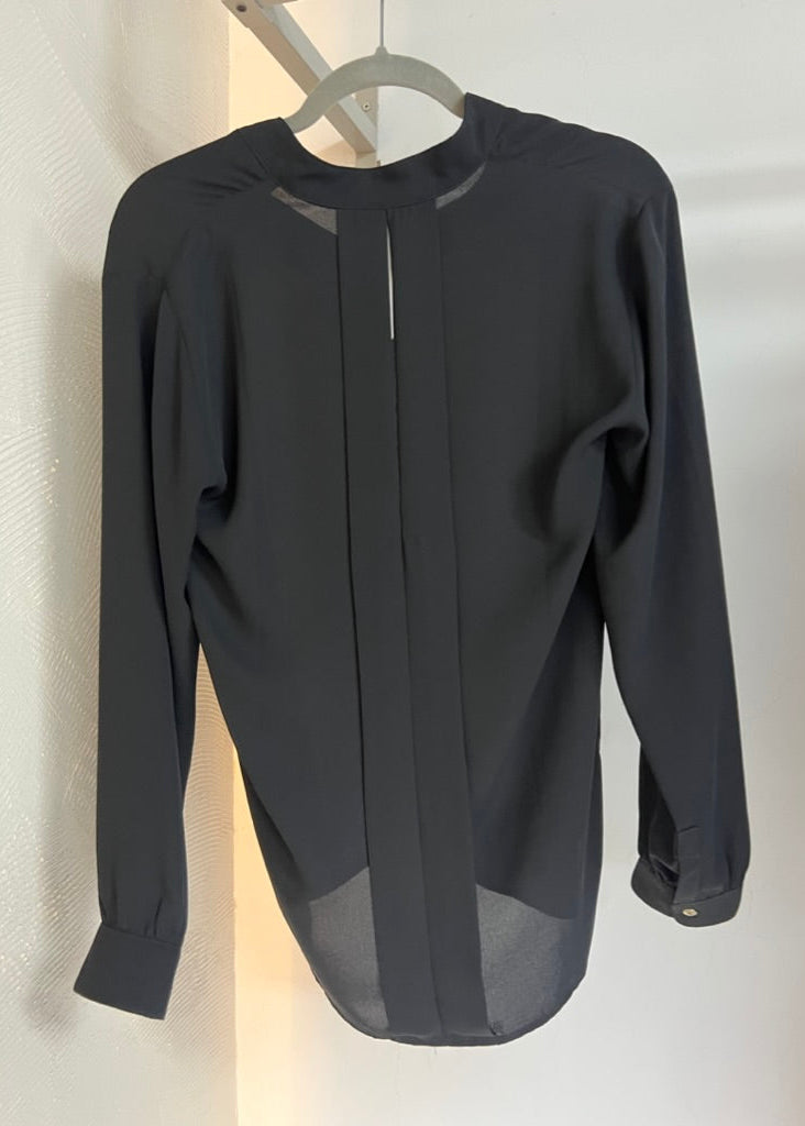 Camisa manga larga clasica escote espalda